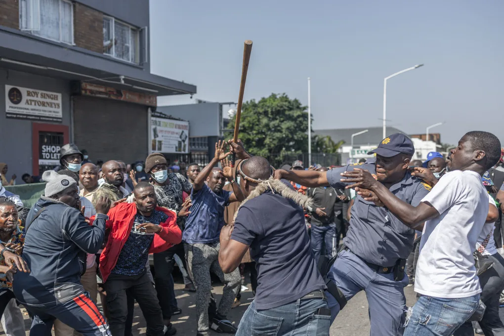 Clashes lead South Africa to withdraw asylum processing order
